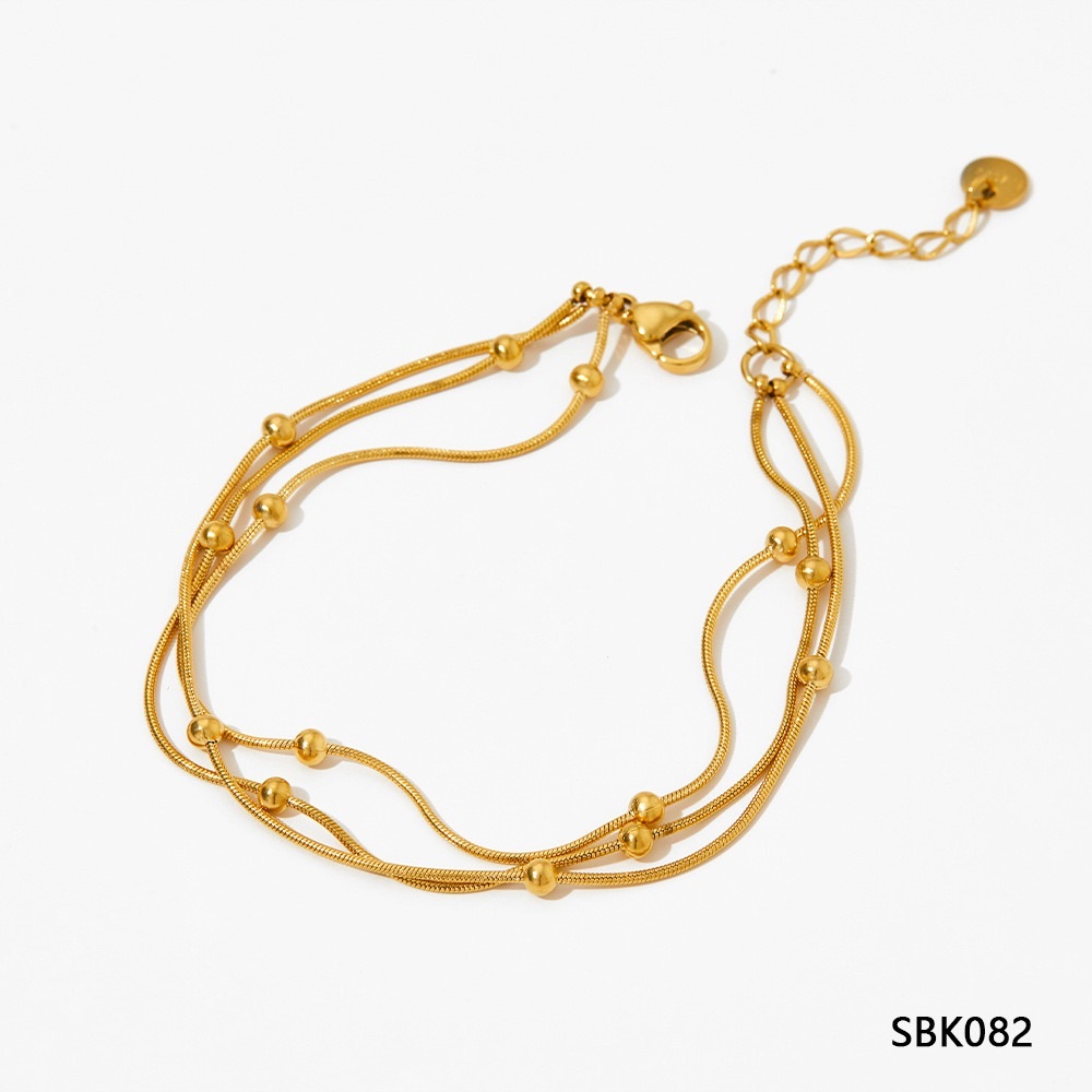Elegant Gold Bracelet with Pearl Accents